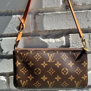 Louis Vuitton Monogram Pochette
Accessories NM